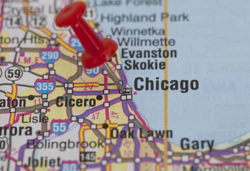 a map with a pushpin on Chicago