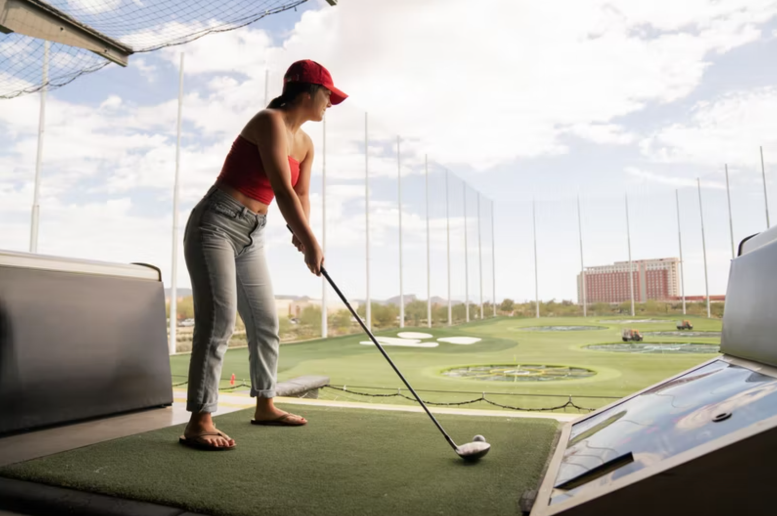 girl playing at Topgolf