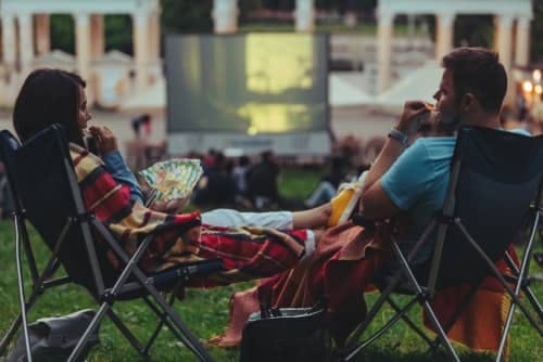a couple at an outdoor movie