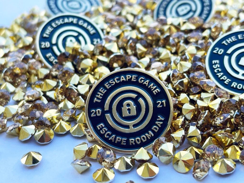 escape room pin surrounded by previous topaz jewels
