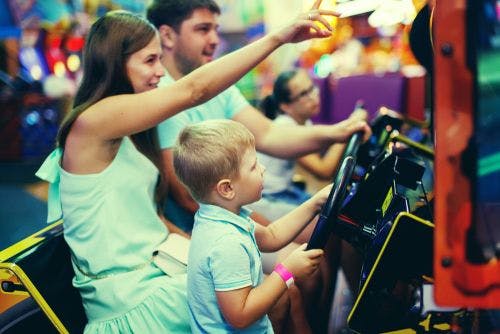 a family at a game arcade