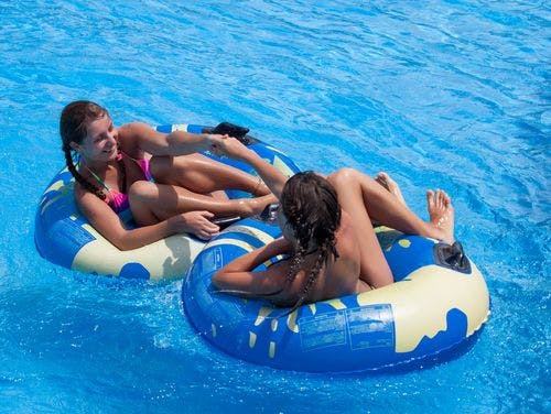 teenage girls in a pool